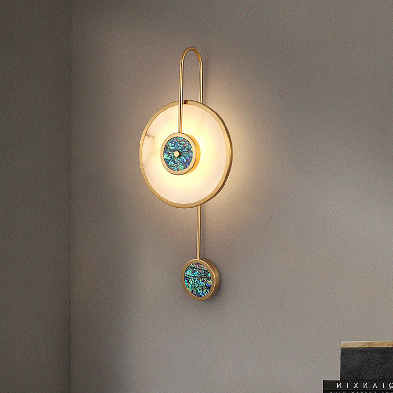 The green-finish version, its alabaster disc and lower disc set with blue-green mosaic stone.