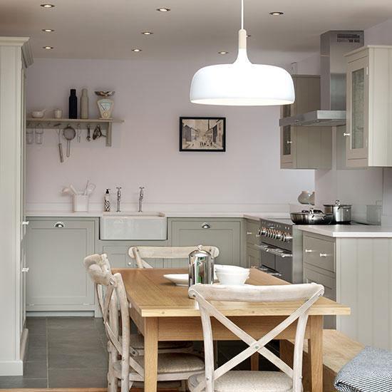 Acorn pendant light hanging in a Shaker-style kitchen