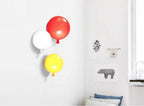 Sculptural balloon wall light with soft atmospheric glow