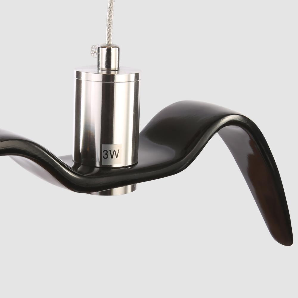 Close view of the nickel neck joint marked 3W on this black Clérachic pendant.