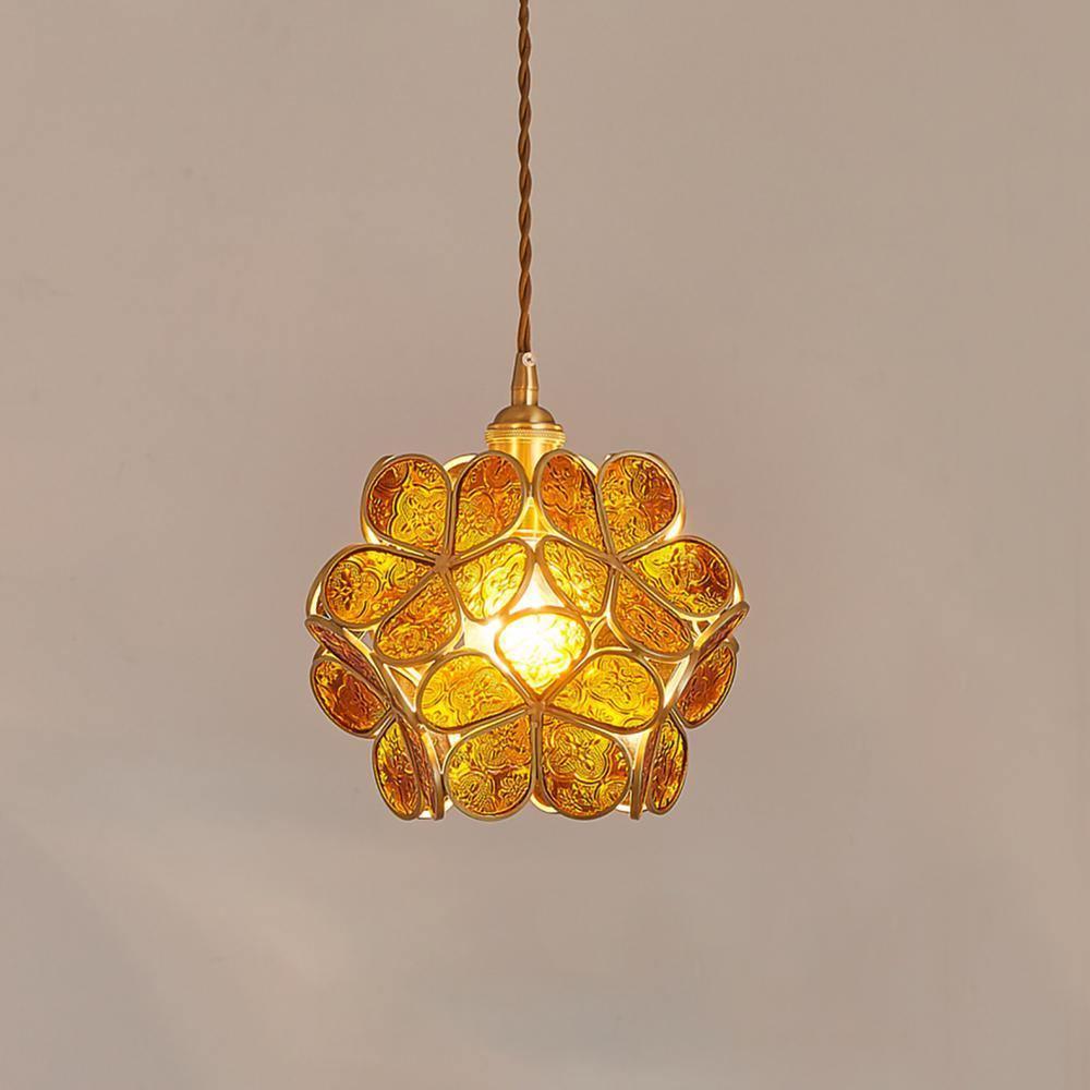 Pink and blue glass petal pendant lights softly lit