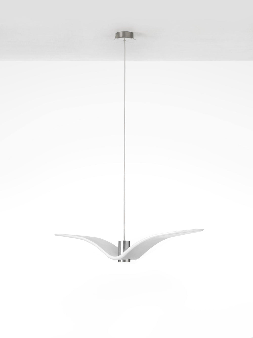 A white bird-shaped pendant from this Clérachic light is seen at an angle, wings tucked, on a plain white backdrop.