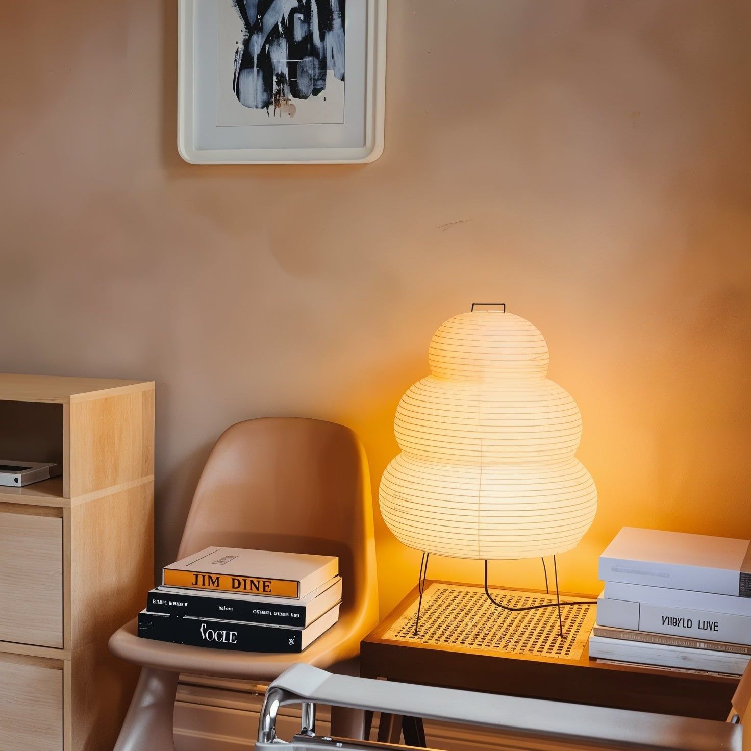 White paper lantern table lamp shown close up on a surface