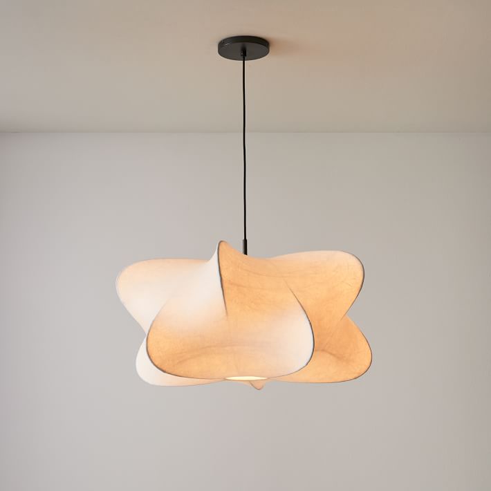 Elysia pendant light lighting a quiet corner of a room