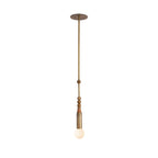 The Clérachic marble-bead pendant hangs from a round brass ceiling canopy against a soft neutral backdrop.