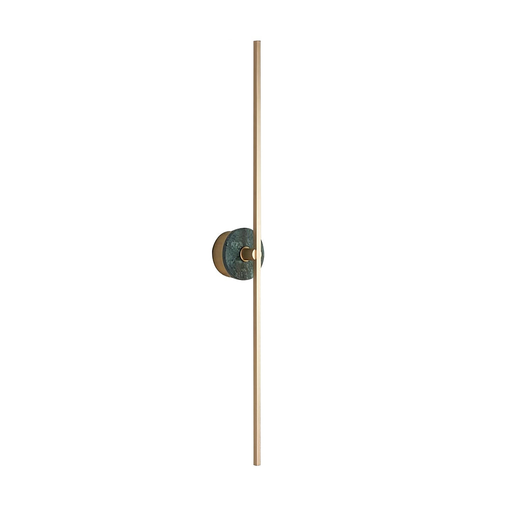 Clérachic wall sconce on a white background, a deep green stone disc crossing the middle of its slender brass bar.