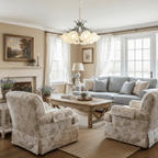 Above a fireplace and floral armchairs, this Clérachic chandelier lights a soft neutral living room.