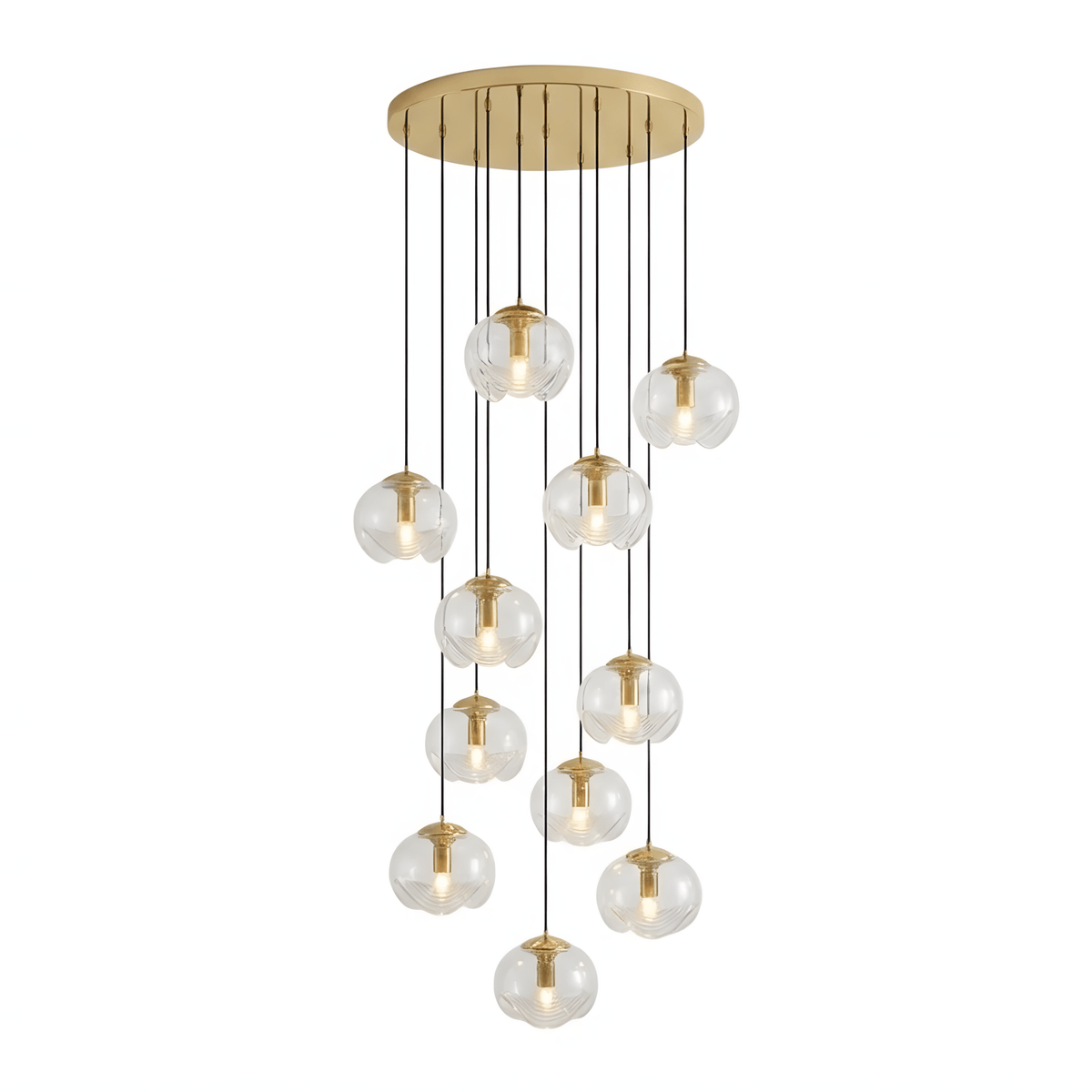 A large dense cascade of amber glass shades drops from a gold ceiling plate, this Clérachic fixture shown on a white background.