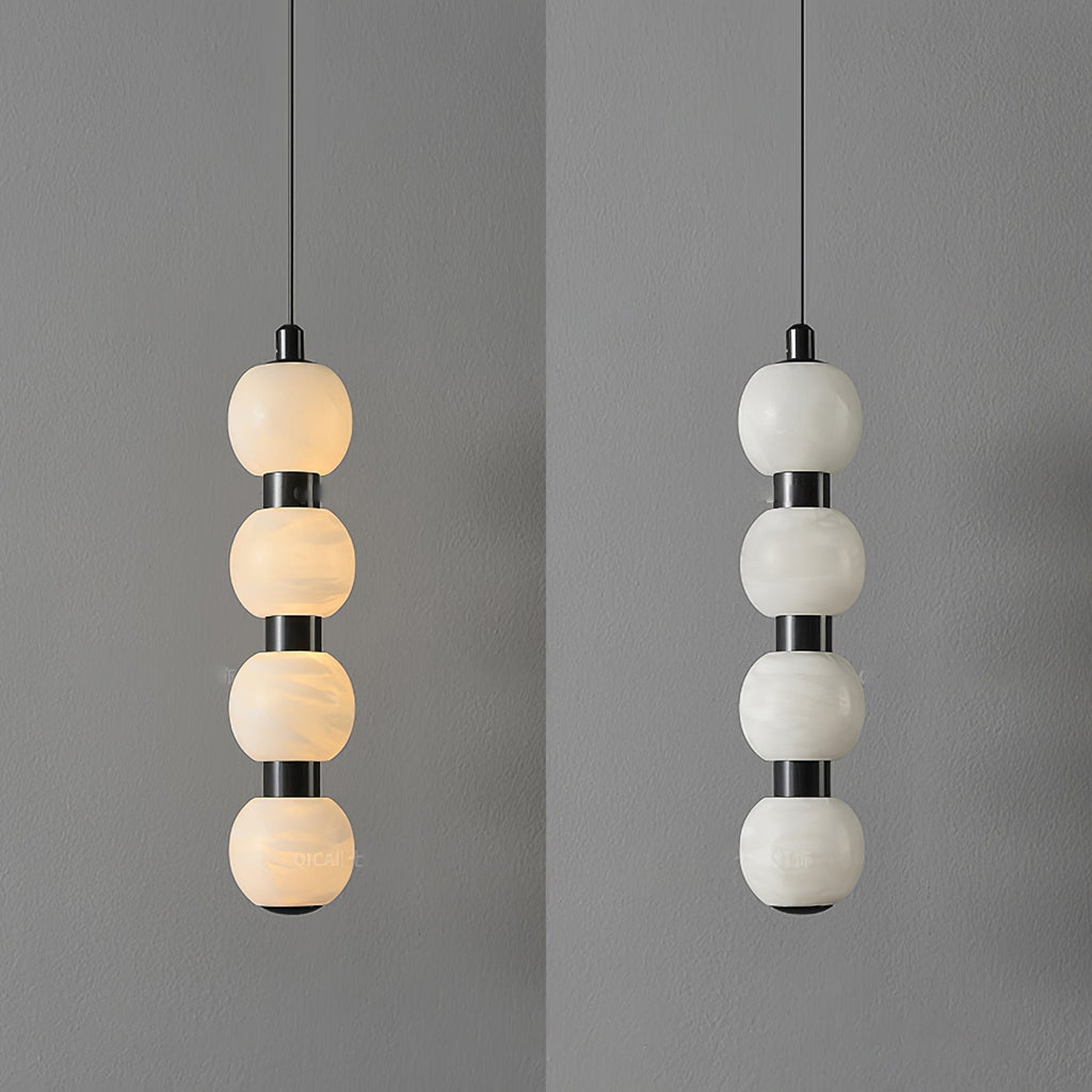 Four-ball Orbique pendant shown lit on the left and switched off on the right for comparison