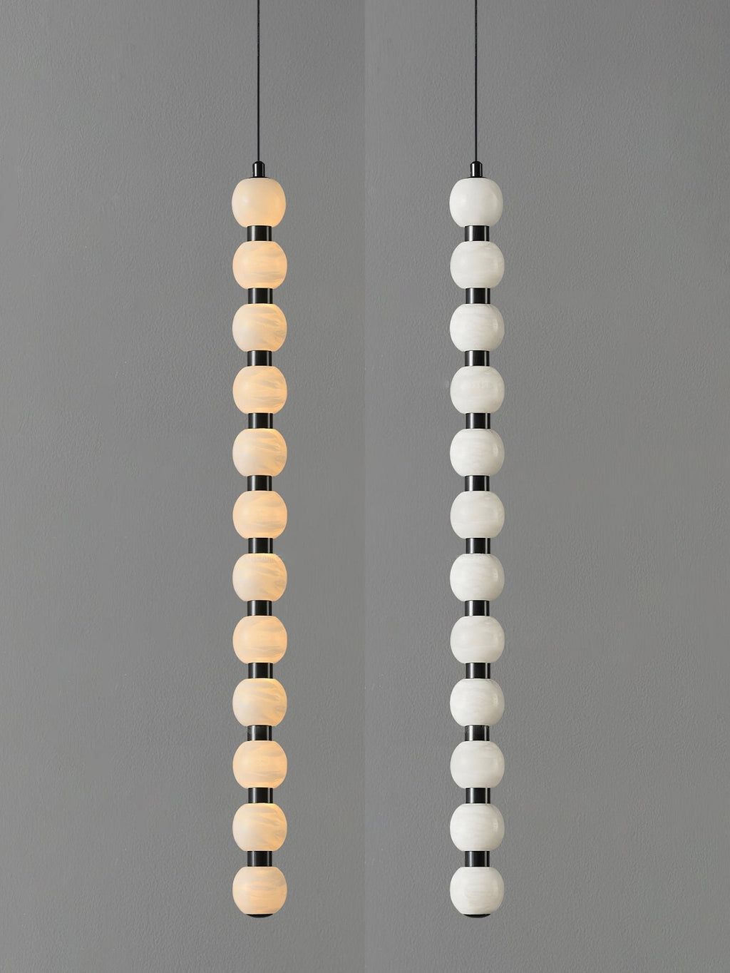 Twelve-ball Orbique pendant side by side, lit on the left and switched off on the right