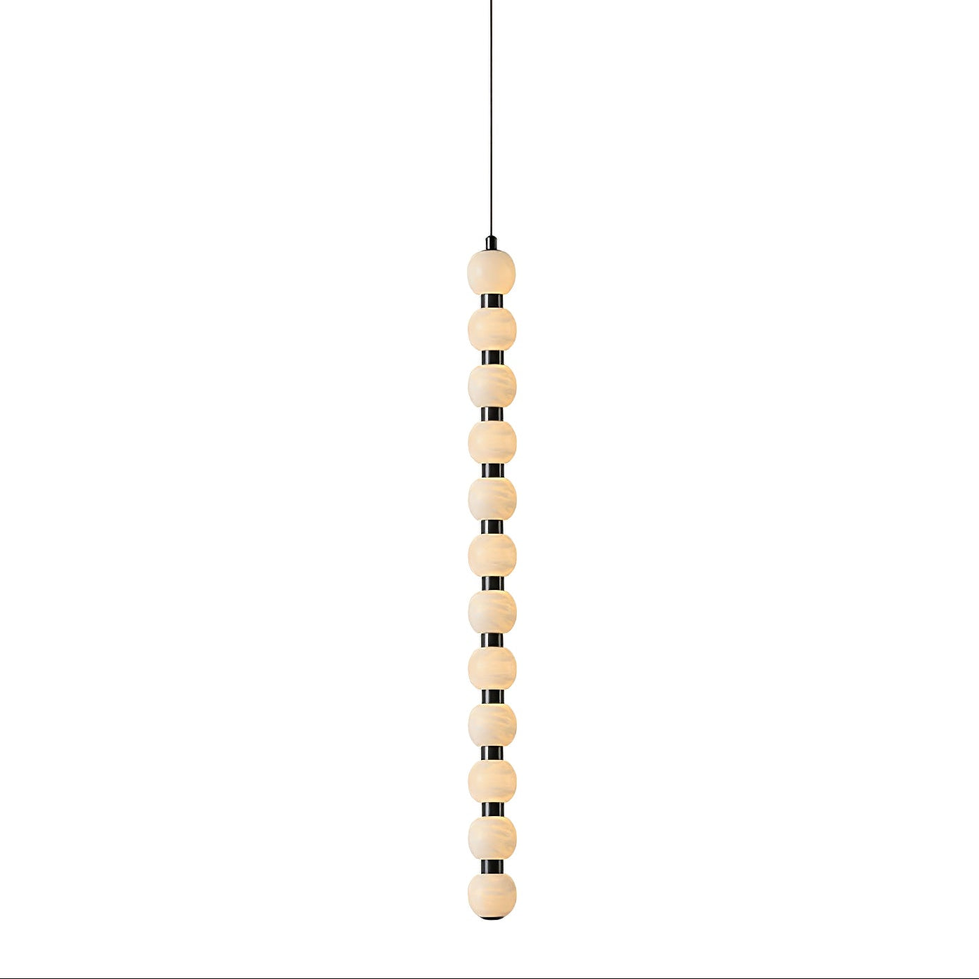 The twelve-ball Orbique pendant at full length, a tall vertical run of glowing alabaster spheres