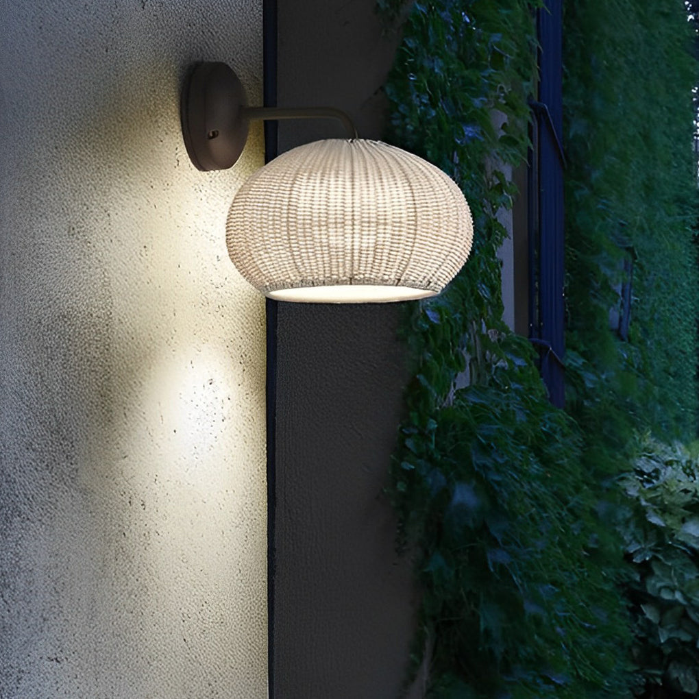 Woven Rattan Wall Lamp For Outdoor Spaces With Lantern-Style Shade