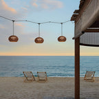 Woven Rattan Wall Lamp For Outdoor Spaces With Lantern-Style Shade