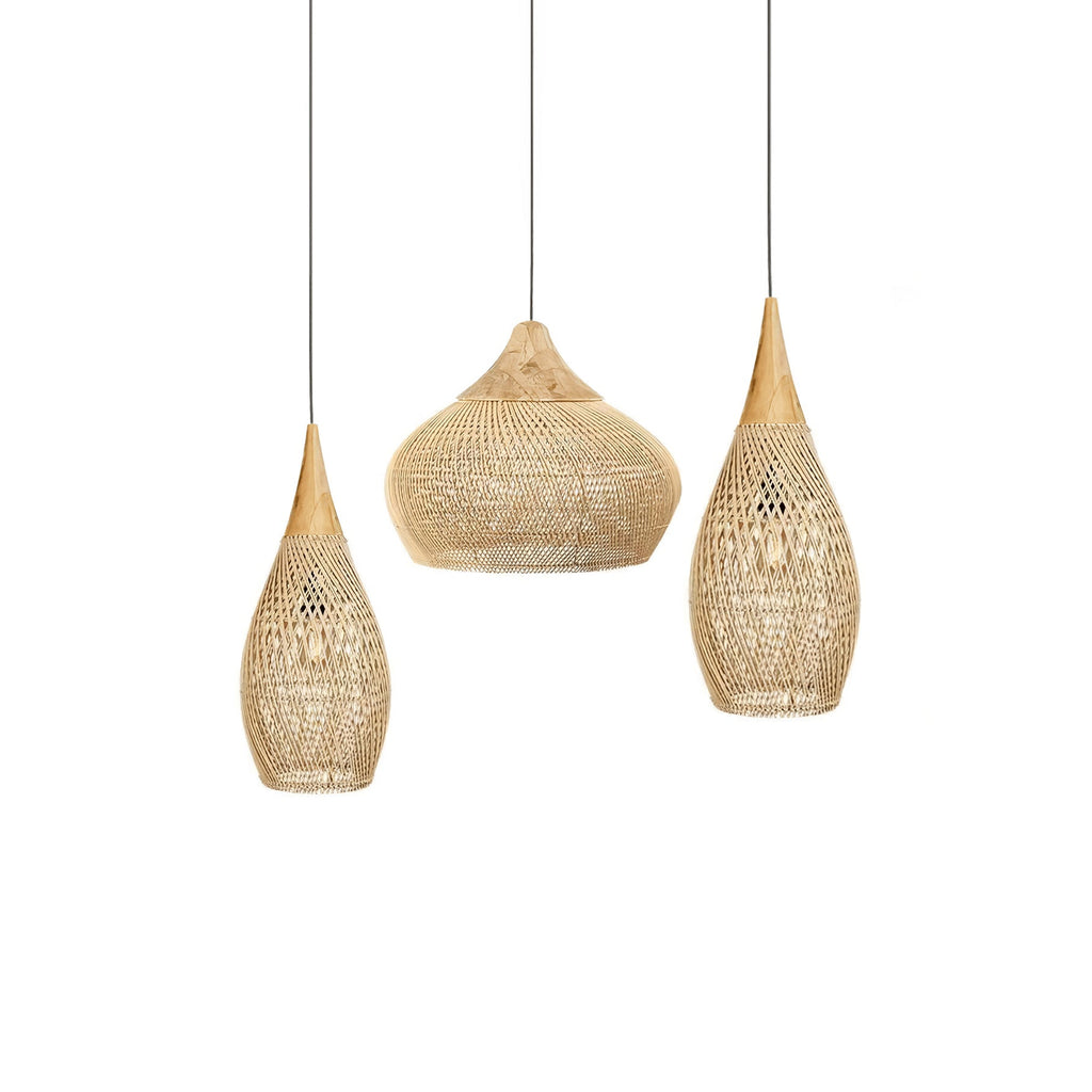 Natural rattan pendant light shown close up with warm glow