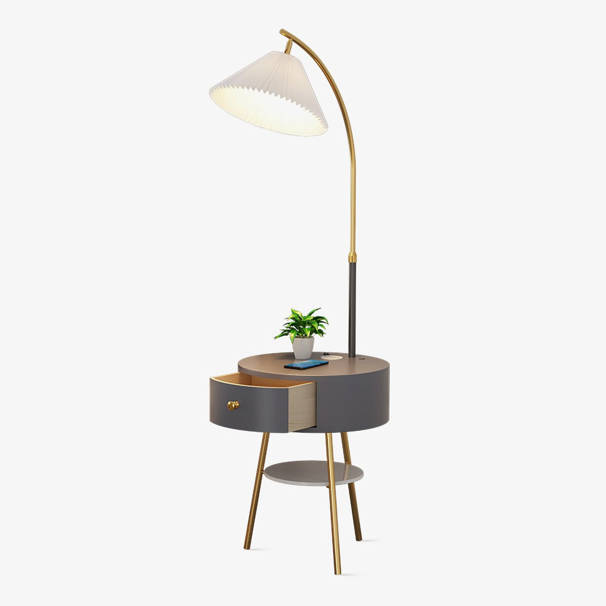 Clérachic pleated-shade arc floor lamp with its round charcoal side table, drawer closed, shown alone on a plain backdrop.