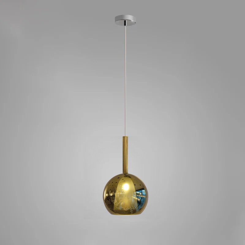Tinted glass globe pendant light shown from below lit