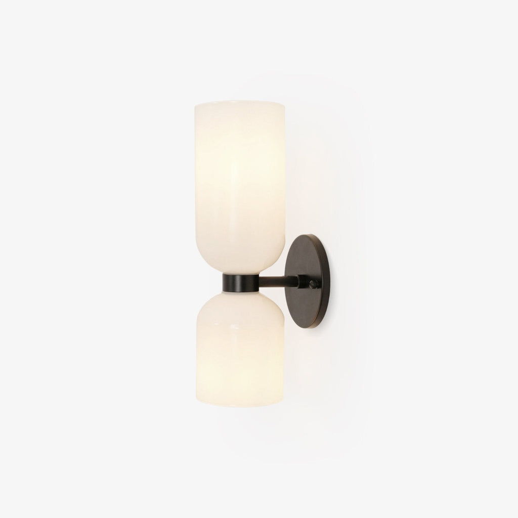 A final view of this matt black Clérachic wall light shows its opal shades against white.