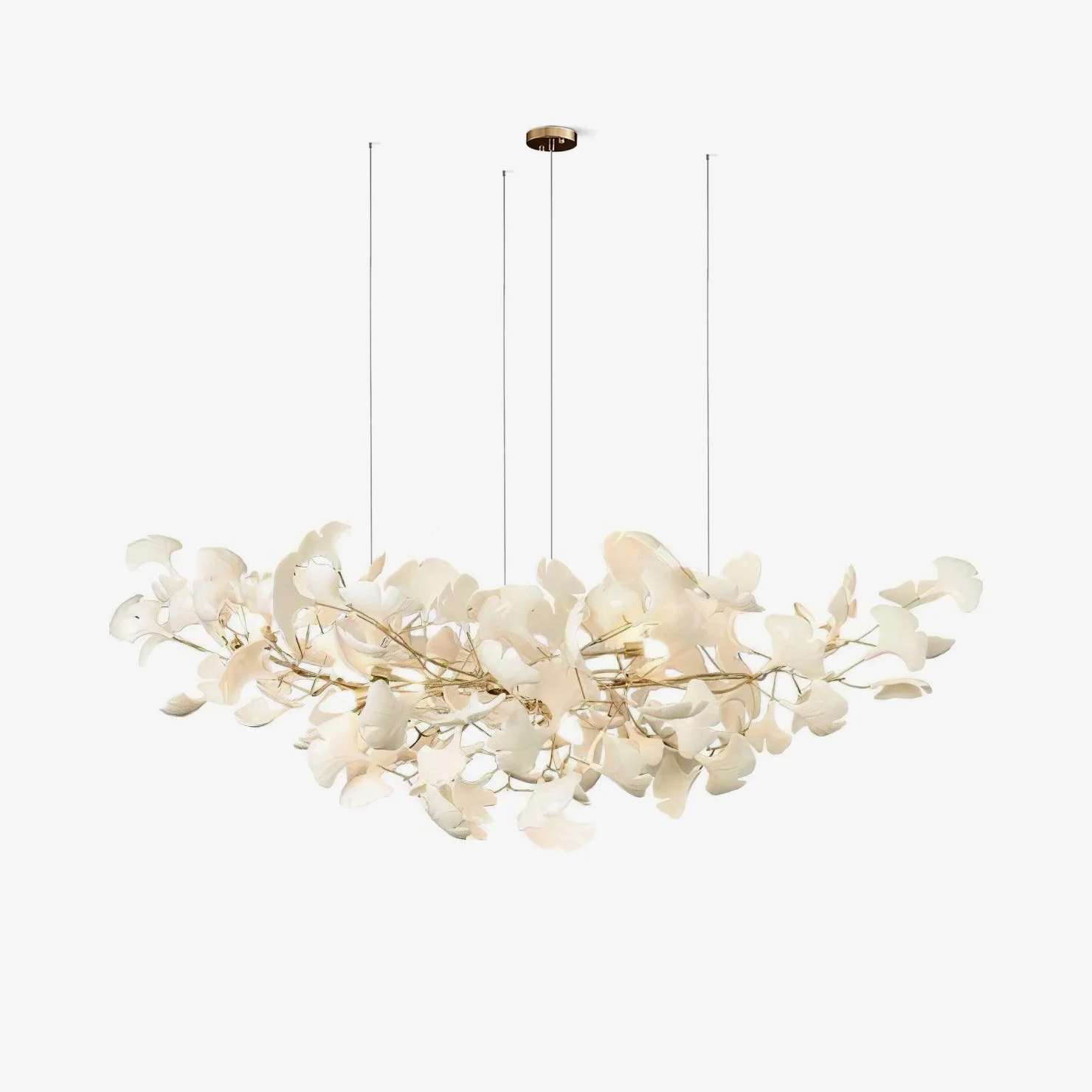 Porcelain gingko chandelier installed above a dining table