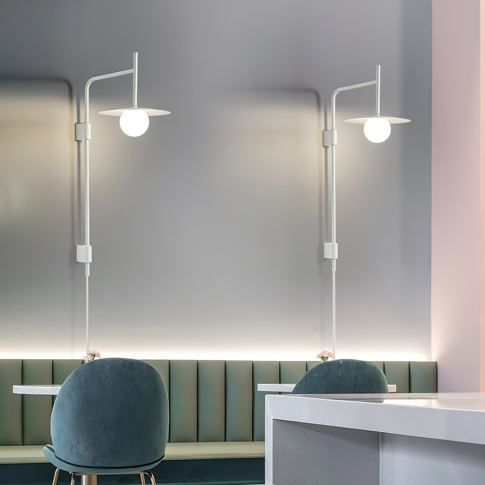 Swing arm wall lamp glowing softly in a cosy interior