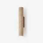 Studio product shot of this Clérachic wall light, unlit, travertine cylinder mounted on a walnut wood plate.