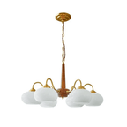 Shown in full against white, this Clérachic chandelier's chain and canopy lead down to six cream shades.