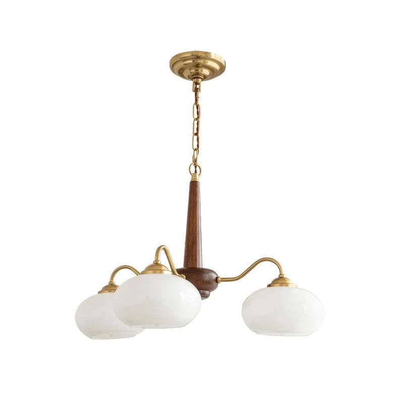 Three white glass shades hang from this Clérachic chandelier, shown in full from canopy to shade against white.