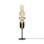 Detail of hand-blown crystal glass components on a floor lamp