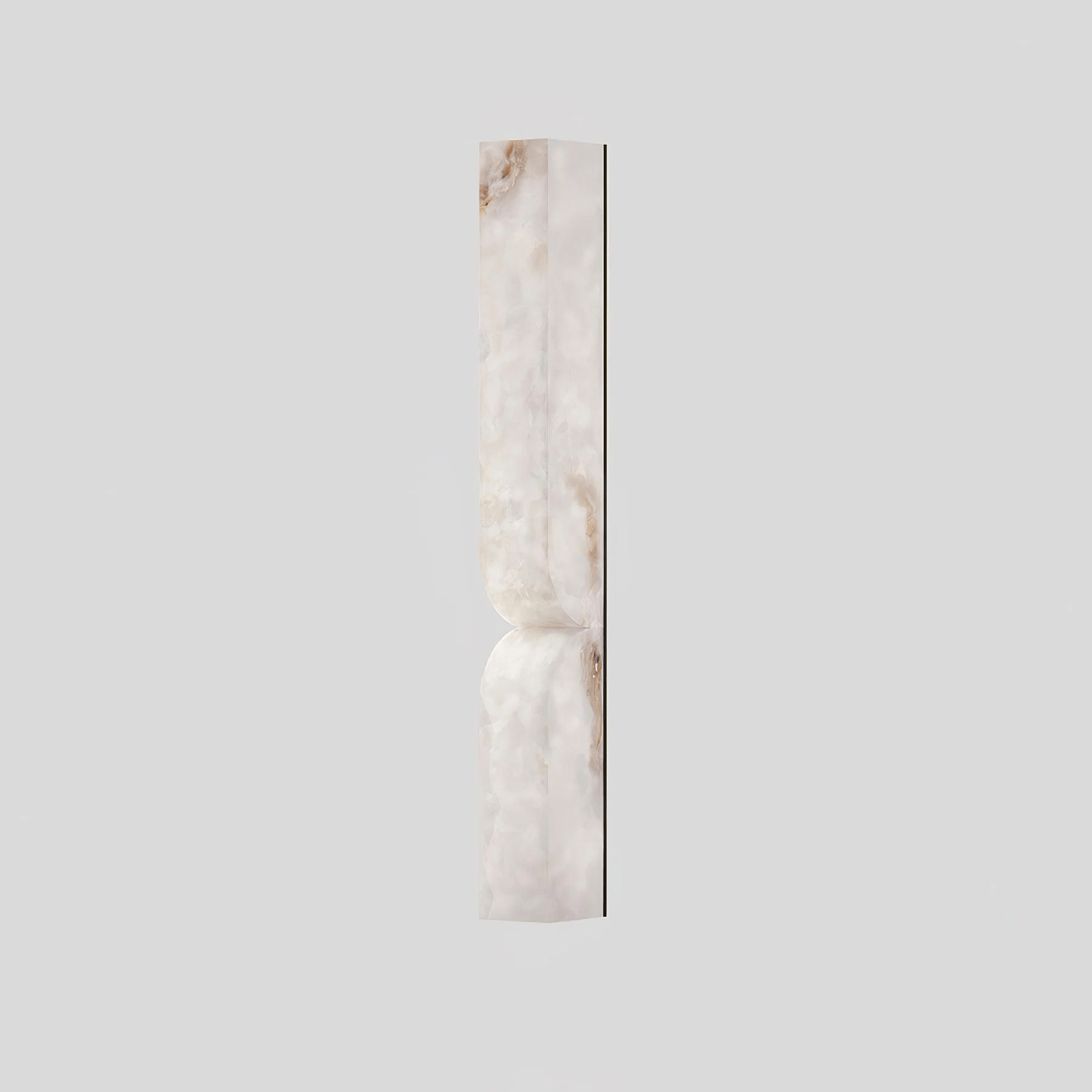 Carved alabaster wall light with gold finish and soft warm light