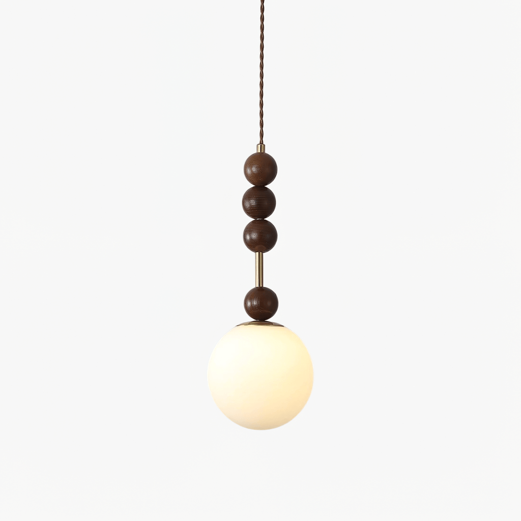 Strung wood bead pendant light detail with glass shade