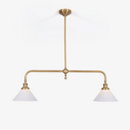 Isolated on white, this Clérachic pendant shows its brass frame and pair of white conical shades, unlit.