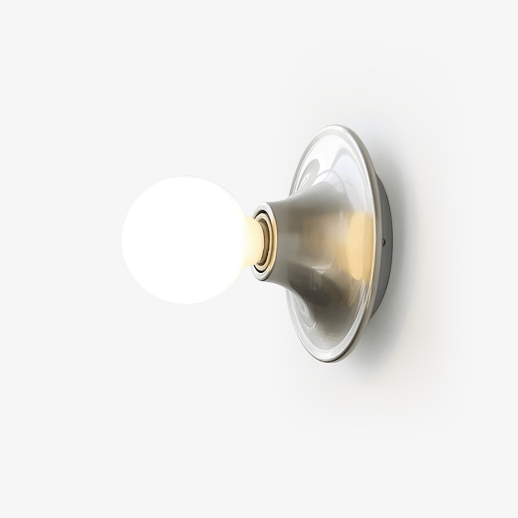 Size diagram showing the Eclipta wall sconce measuring 5.9 inches in diameter and height