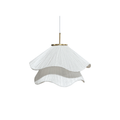 Ethereal Bloom pendant light glowing with layered white pleated shade and gold canopy