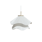 Ethereal Bloom pendant light glowing with layered white pleated shade and gold canopy