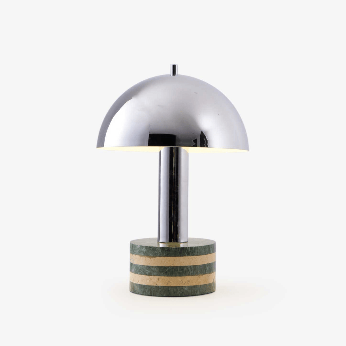 Clérachic table lamp shown alone on a plain background, its mirror-polished chrome dome set above a green and beige marble base.