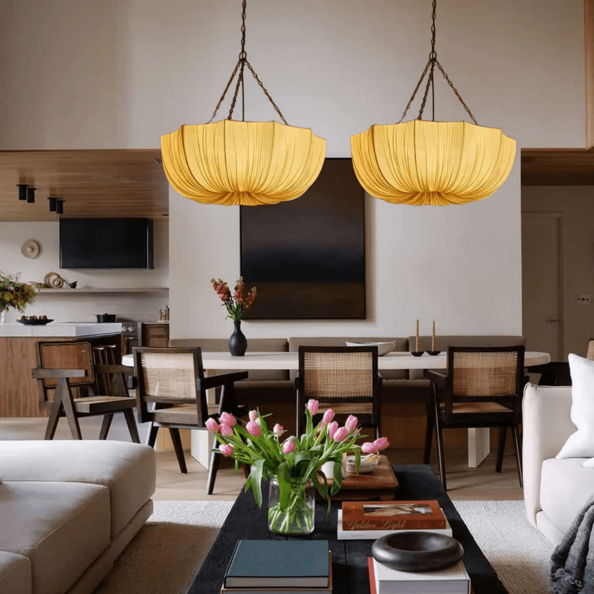 Cotton pendant light with black frame in a soft-lit lounge