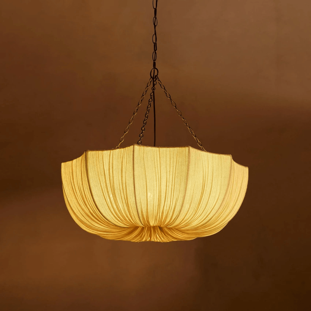 Gathered cotton pendant light shown in a refined interior