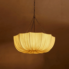Gathered cotton pendant light shown in a refined interior