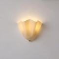Petalia wall sconce with translucent petal-shaped glass shade