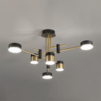 Spider chandelier showing gold and black arms reaching outward