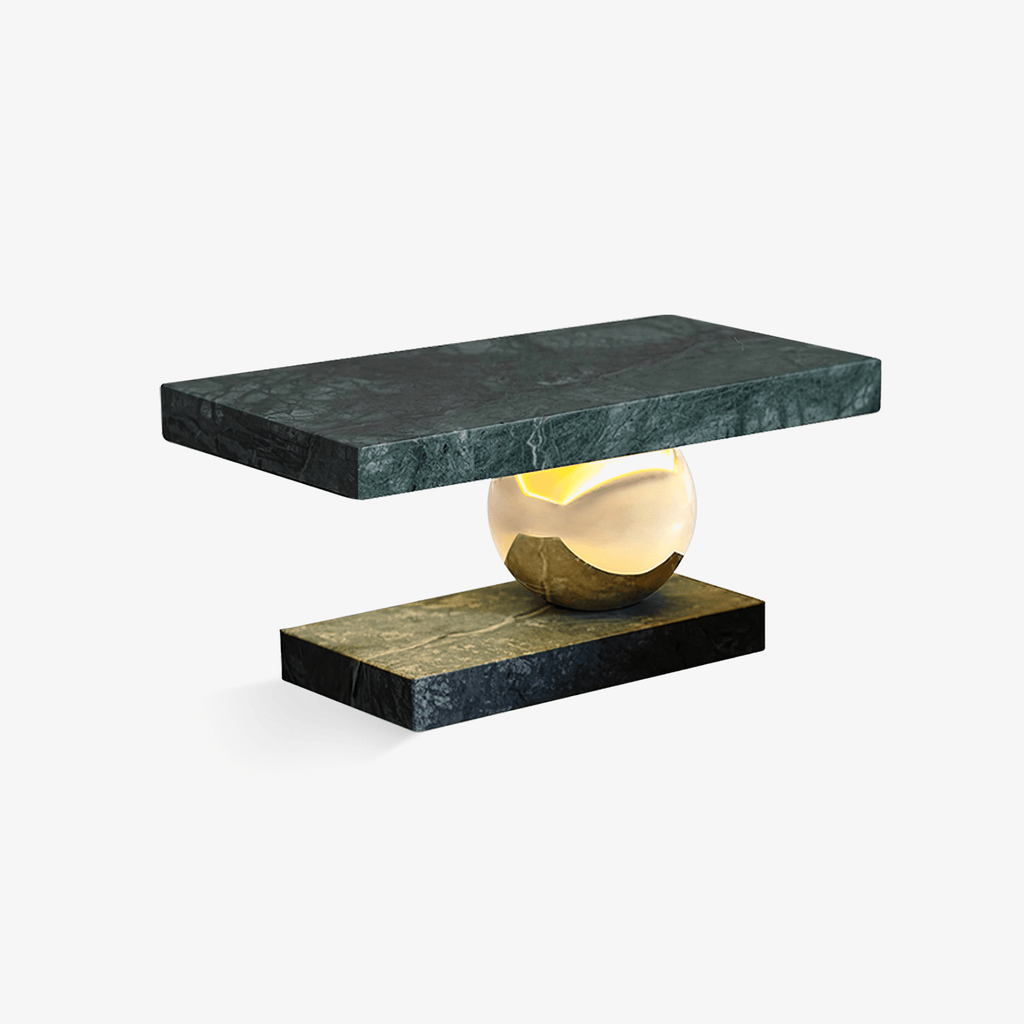 Clérachic green marble table lamp with a brass sphere base, shown unlit on a plain white studio background.