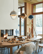 Multi-Lite pendant light shown with the shade halves turned for a soft ceiling glow