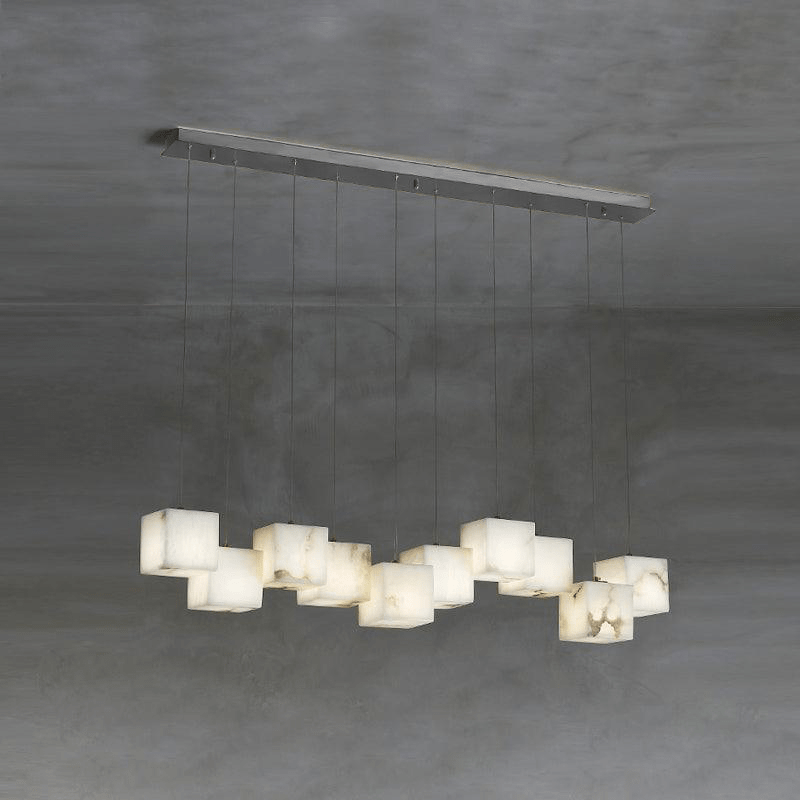 Silver ten-head Ivnoros chandelier seen from below, its thin suspension cables nearly invisible.