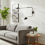 Wall sconce shade and arm joint detail showing rotation point