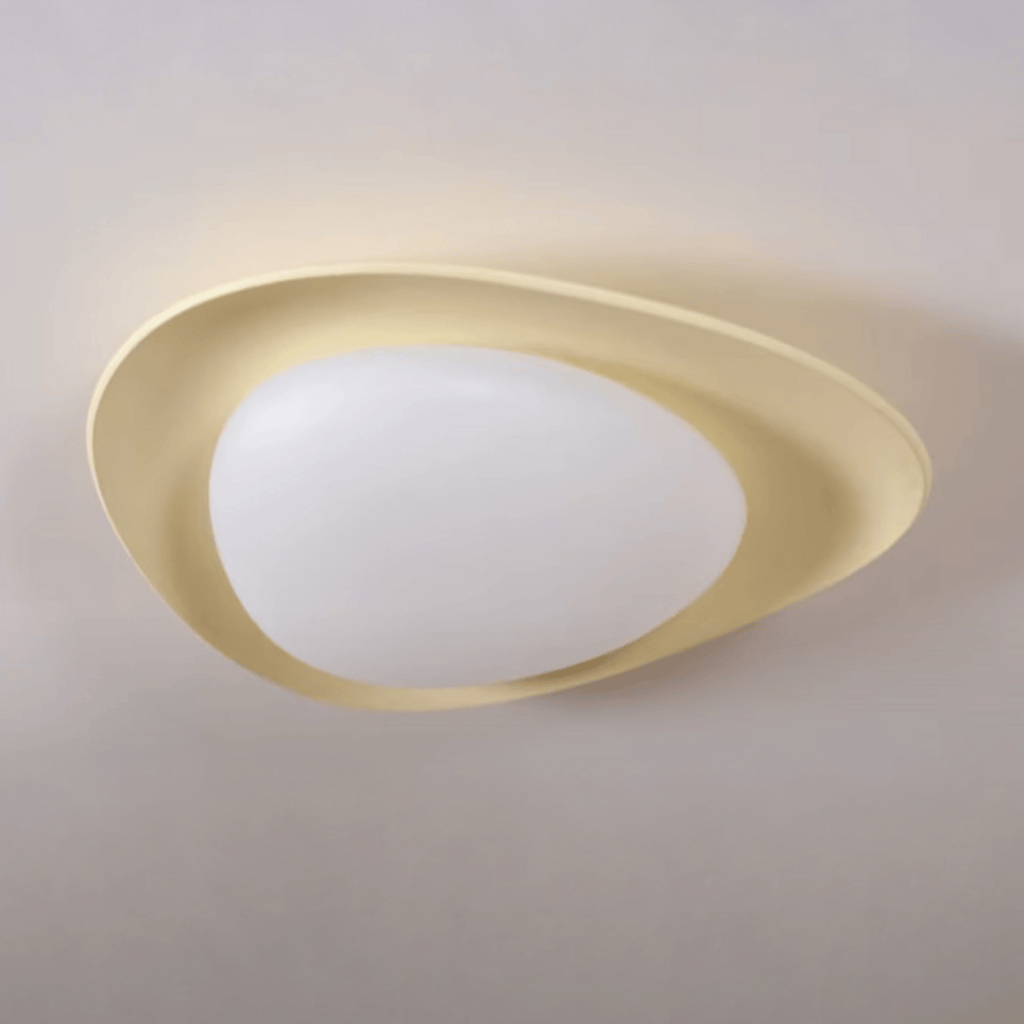 In beige, a colour this Clérachic ceiling light comes in, its resin shell glows warm around the white diffuser.