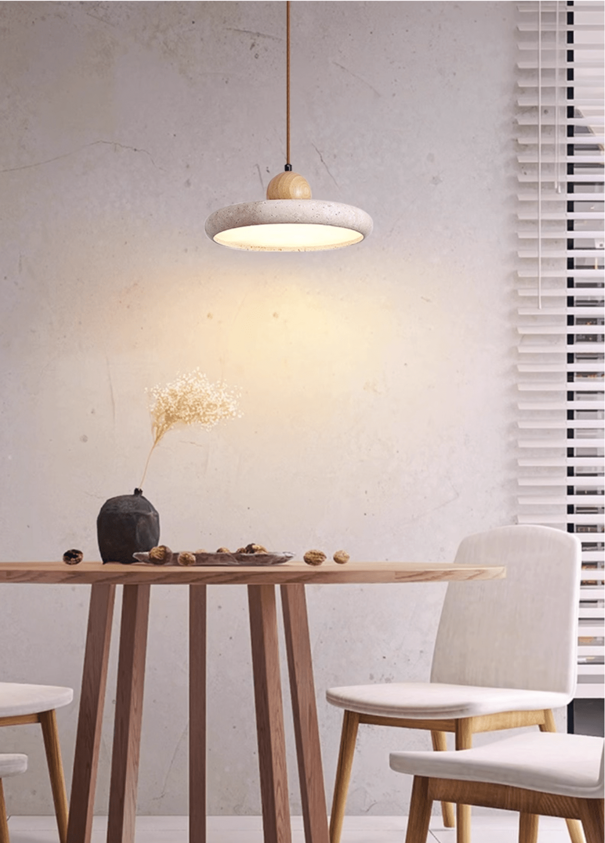 Travertine pendant light in neutral white light in a modern room