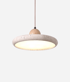 Travertine pendant light with wood frame in a softly lit room