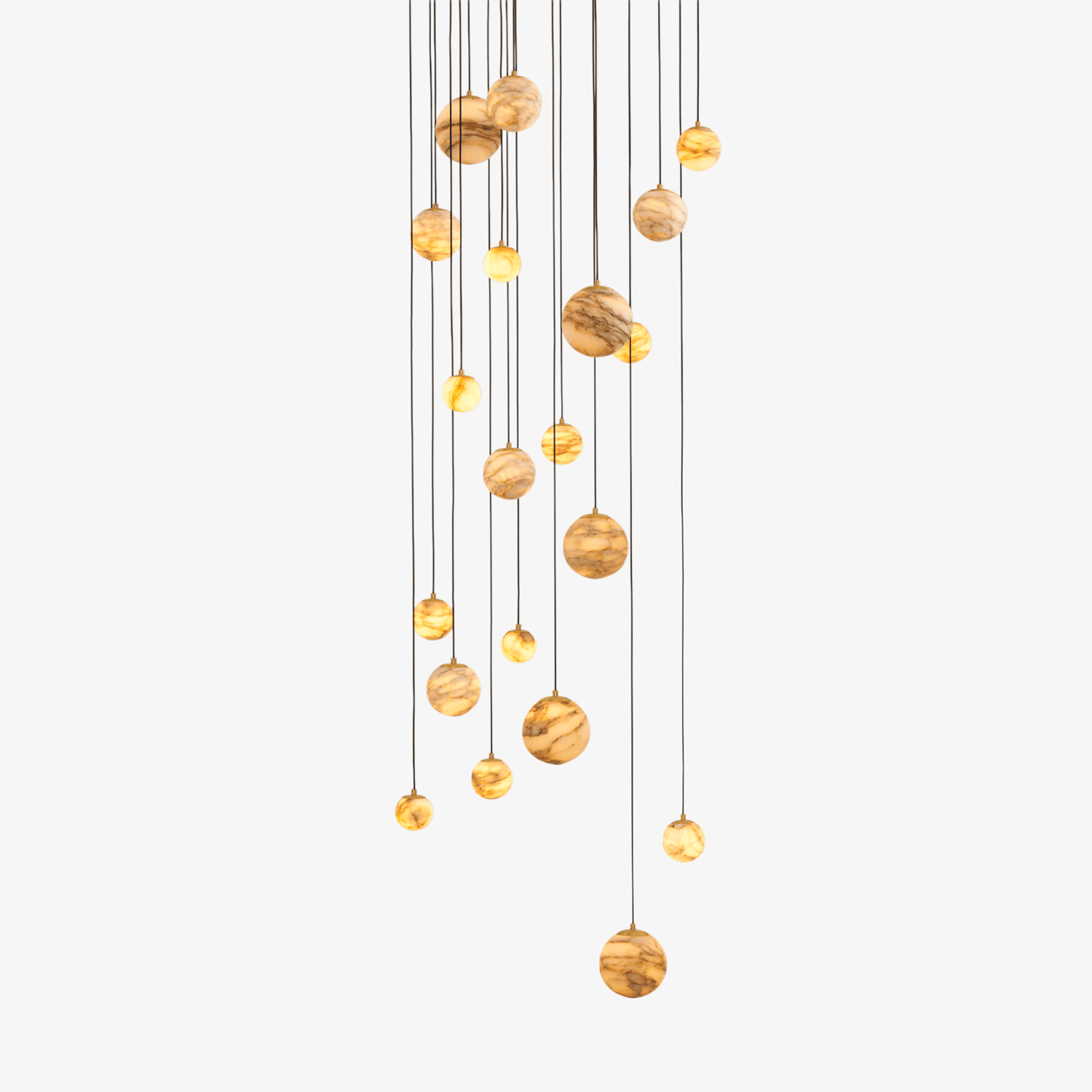 Cropped detail of the chandelier's alabaster globes, mixing larger and smaller stone spheres on fine cables.