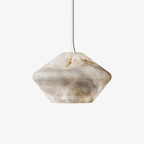 Catalogue view of the Tyler pendant on plain white, its faceted stone shade hanging from a slim ceiling cable.