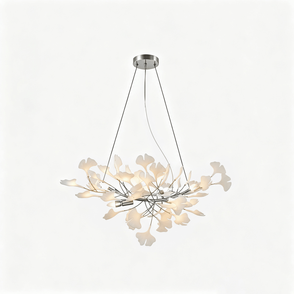 Porcelain leaf chandelier casting warm light in an elegant room