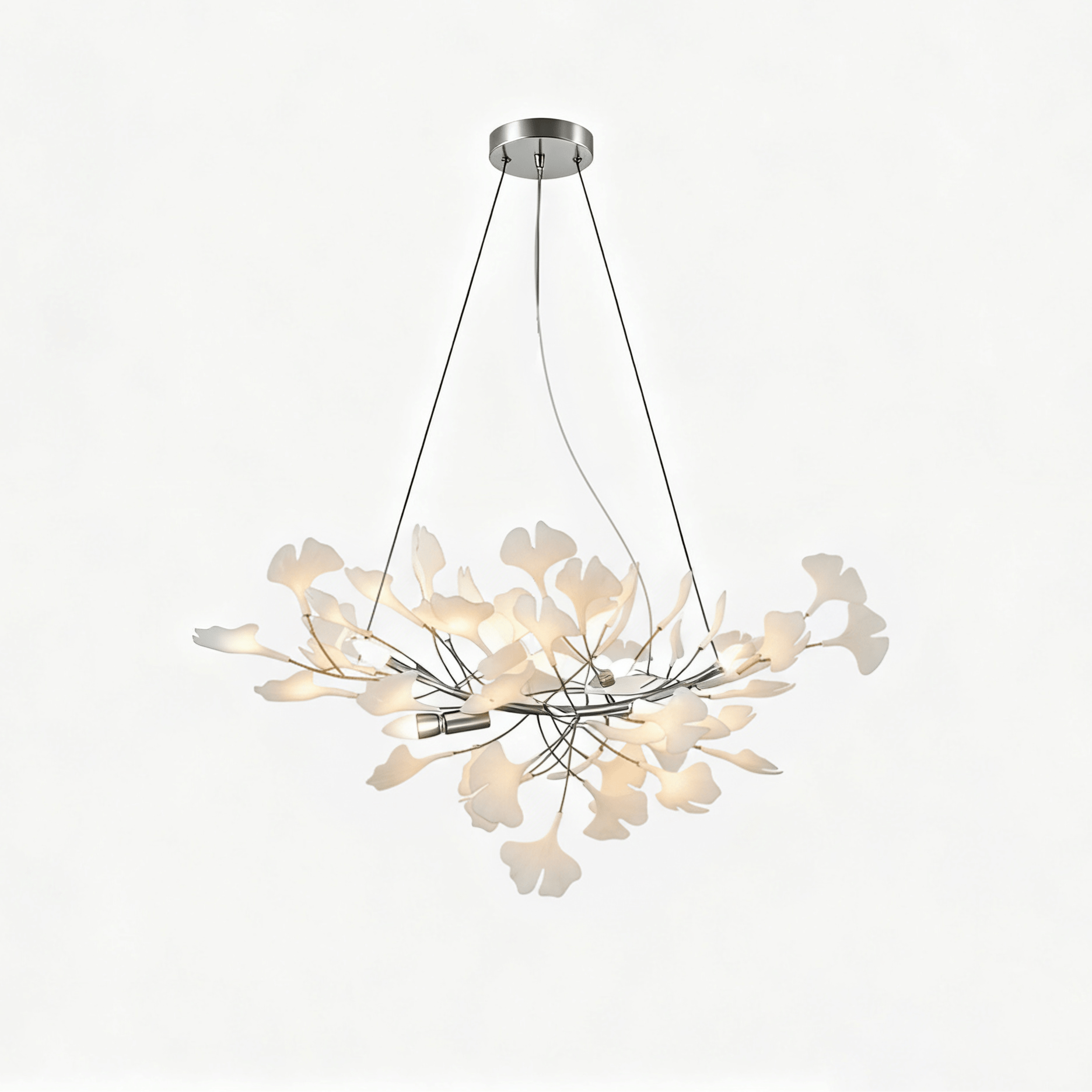 Porcelain gingko chandelier fanned out across a high ceiling